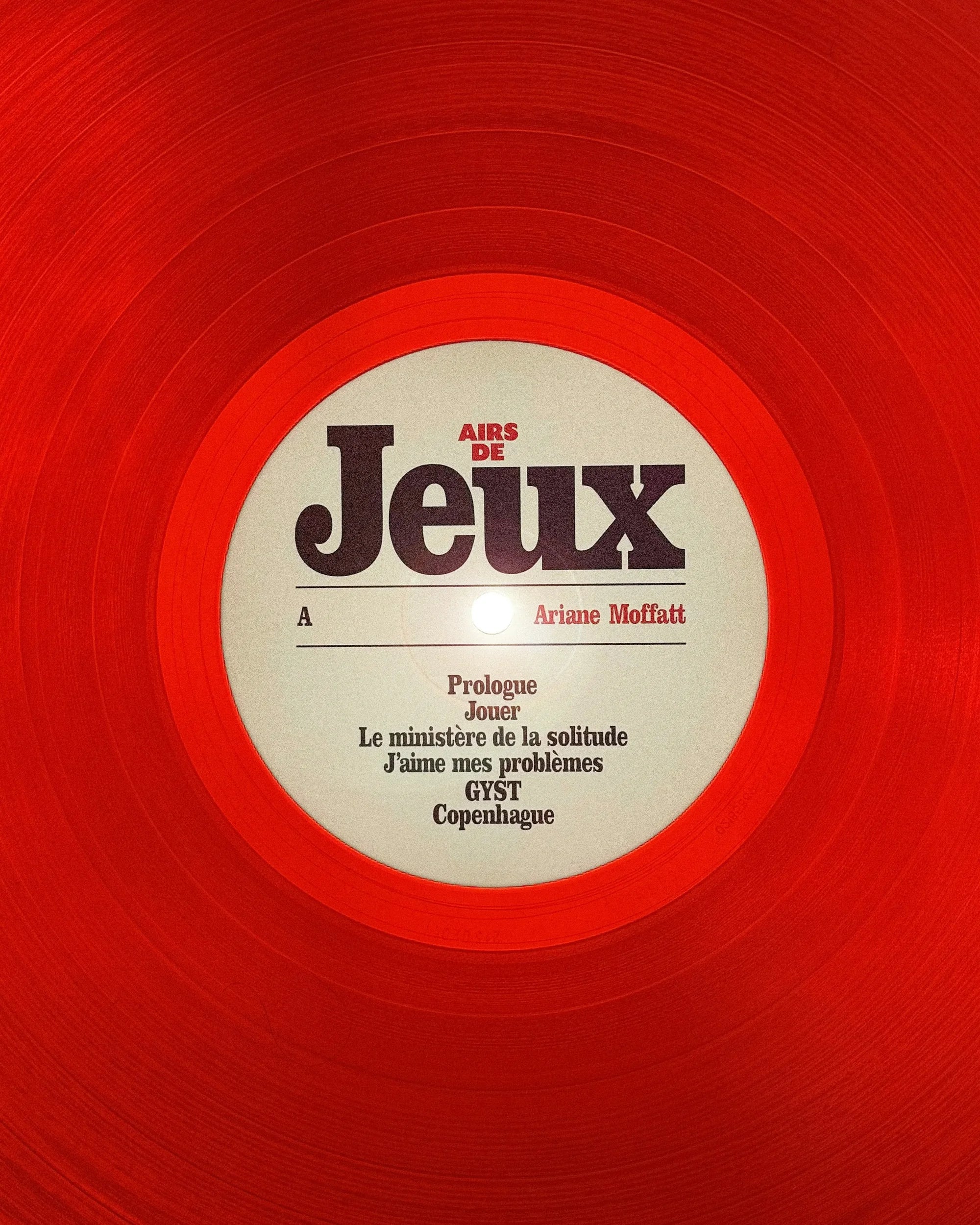 Airs de Jeux — vinyle rouge translucide, face A, étiquette avec liste des titres