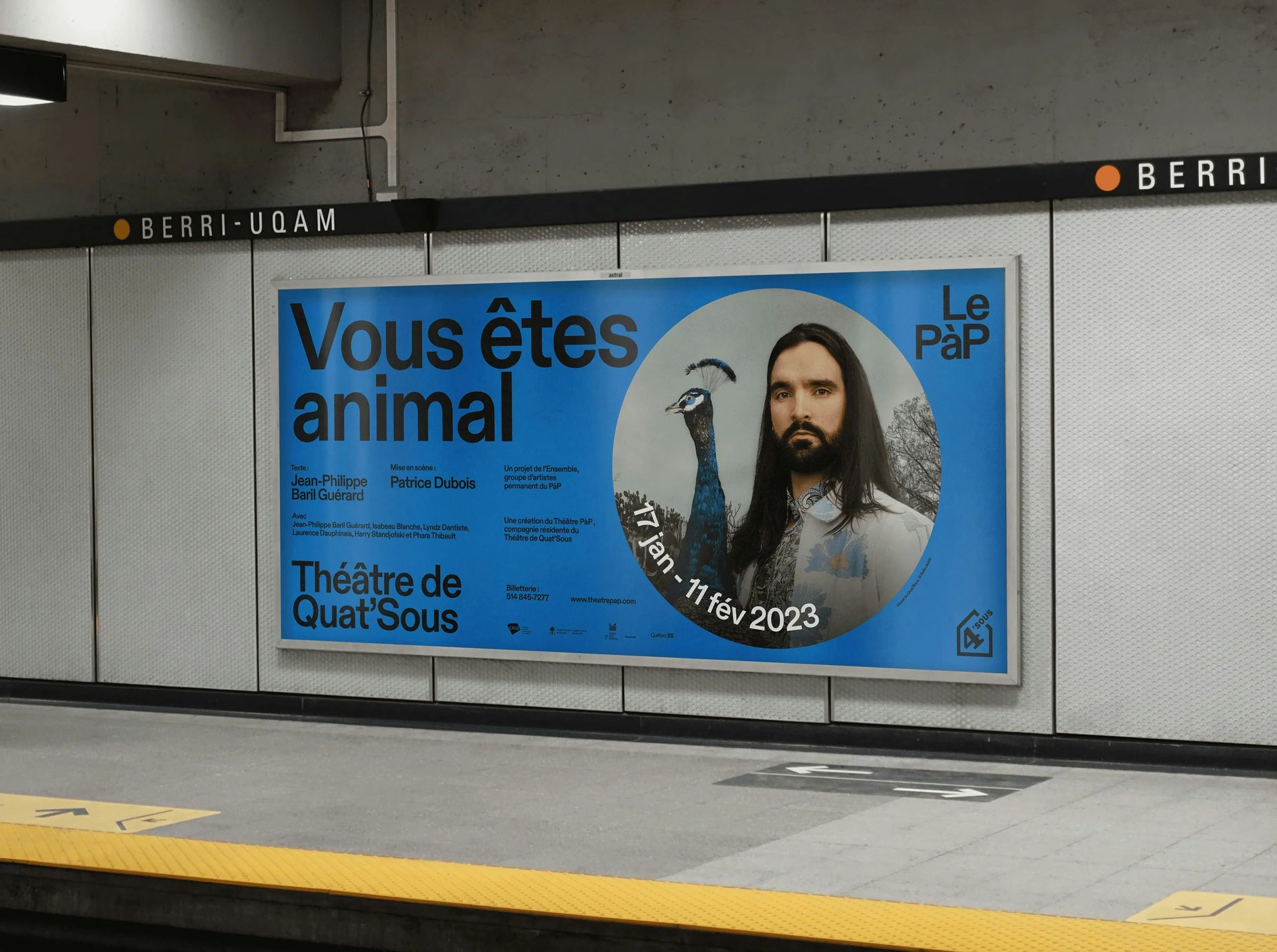 Le PàP — affiche bleue « Vous êtes animal » dans une station de métro Berri-UQAM