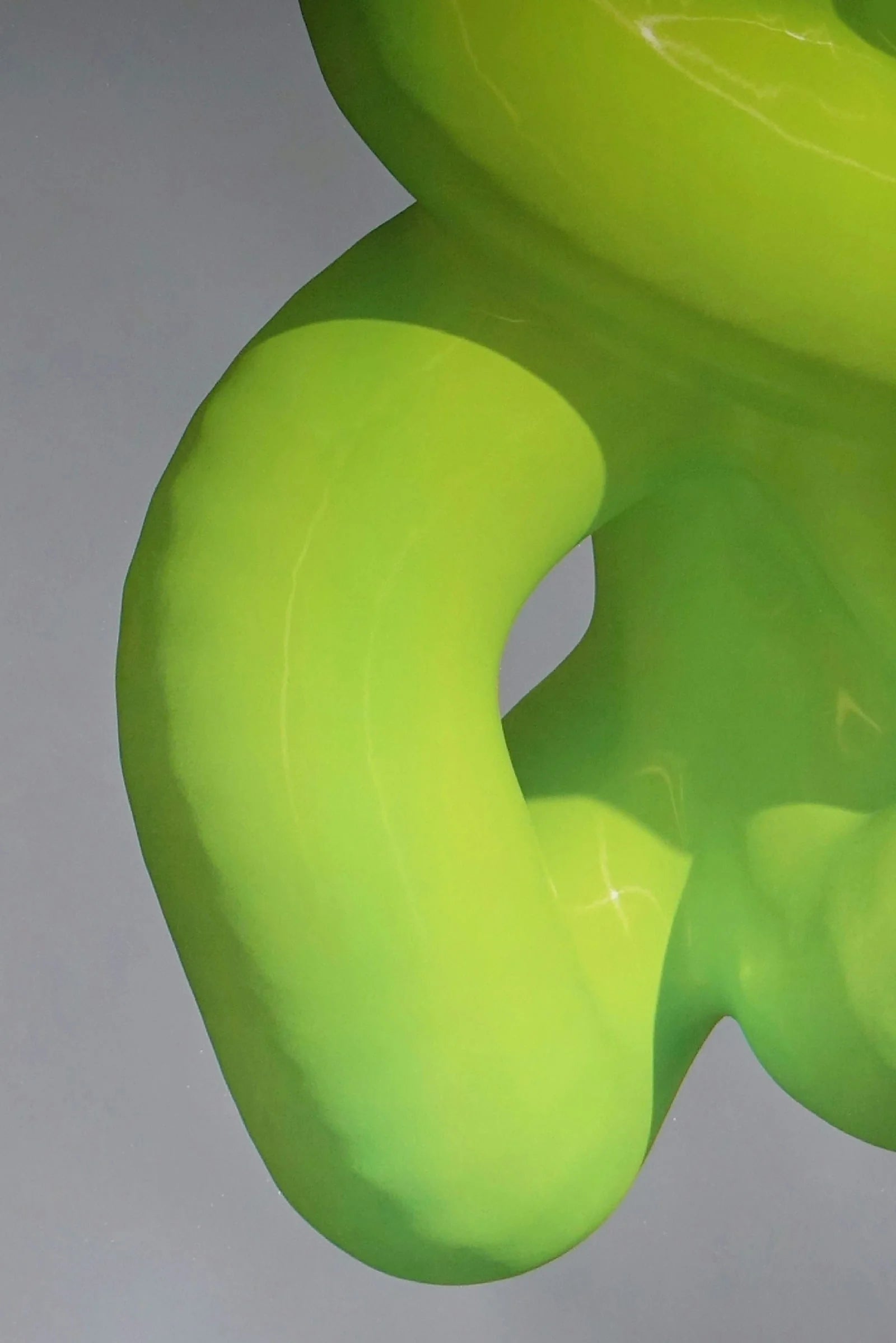 Face au néant — gros plan d'une forme organique 3D vert lime lustrée, visuel central de l'affiche