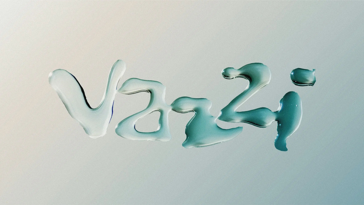 Vazzi — logo formé de gouttes d'eau translucides sur surface claire